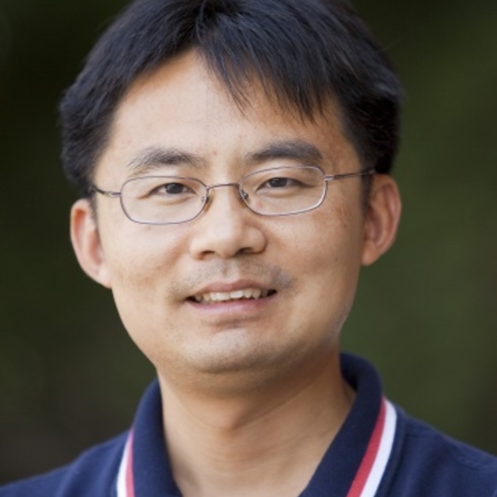 Jun Wang portrait, blue shirt